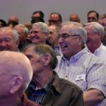 Men enjoy a laugh at the conference, “Lord, To Whom Shall We Go?”