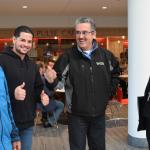 Men meeting Bishop Cisneros, right, at the Spanish-speaking track are, from left: Angel Martinez, Alberto Martinez and Felix Pereira.