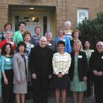 Bishop Cullen gathers with members of the new diocesan Commission for Women before their inaugural meeting June 23, 2004.