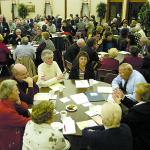 Parishioners gather in small groups to discuss individual topics during the Lehigh Deanery Synod Consultation. Approximately 1,400 Catholics from the Diocese of Allentown participated in the six Synod Listening Sessions conducted throughout the diocese, one in each deanery, Oct. 17 through Nov. 7, 2005.