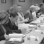Members of the Diocesan Pastoral Council review materials during their historic first meeting Feb. 6, 2007 at St. Thomas More, Allentown, to begin implementing statutes developed by the Second Synod of Allentown