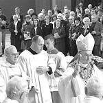 Cathedral parishioners and friends watch Oct. 27, 2001 as Bishop Cullen blesses the new John and Margaret Walson Center in honor of the completion of Phases I and II of a $5 million-plus long-term building and revitalization project at the Cathedral of St. Catharine of Siena, Allentown.