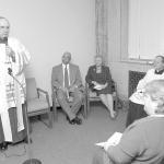 The Most Rev. Edward P. Cullen, D.D., Bishop of Allentown, offers remarks Jan. 16, 2003 during the blessing and dedication of the new location for the Berks County Catholic Social Agency in the Madison Building at 400 Washington St., Reading. Among others on hand to witness the event are, from left, Jose Borras-Osorio, Berks CSA County Administrator, and Barbara W. Murphy, M.S.W., Secretary for Catholic Human Services and Executive Director of CSA.